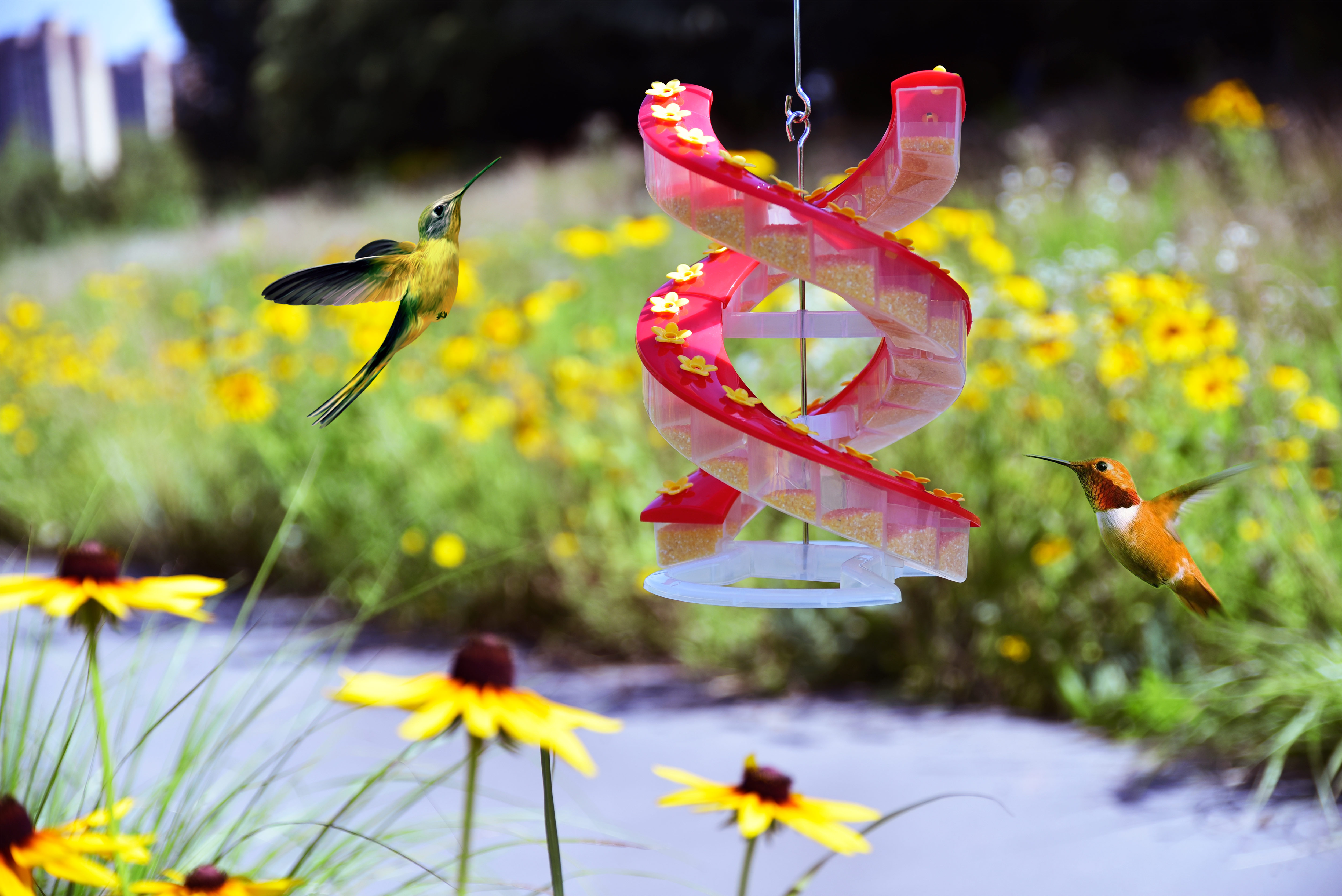 Sherem DNA Helix Hummingbird Feeder in use in a garden