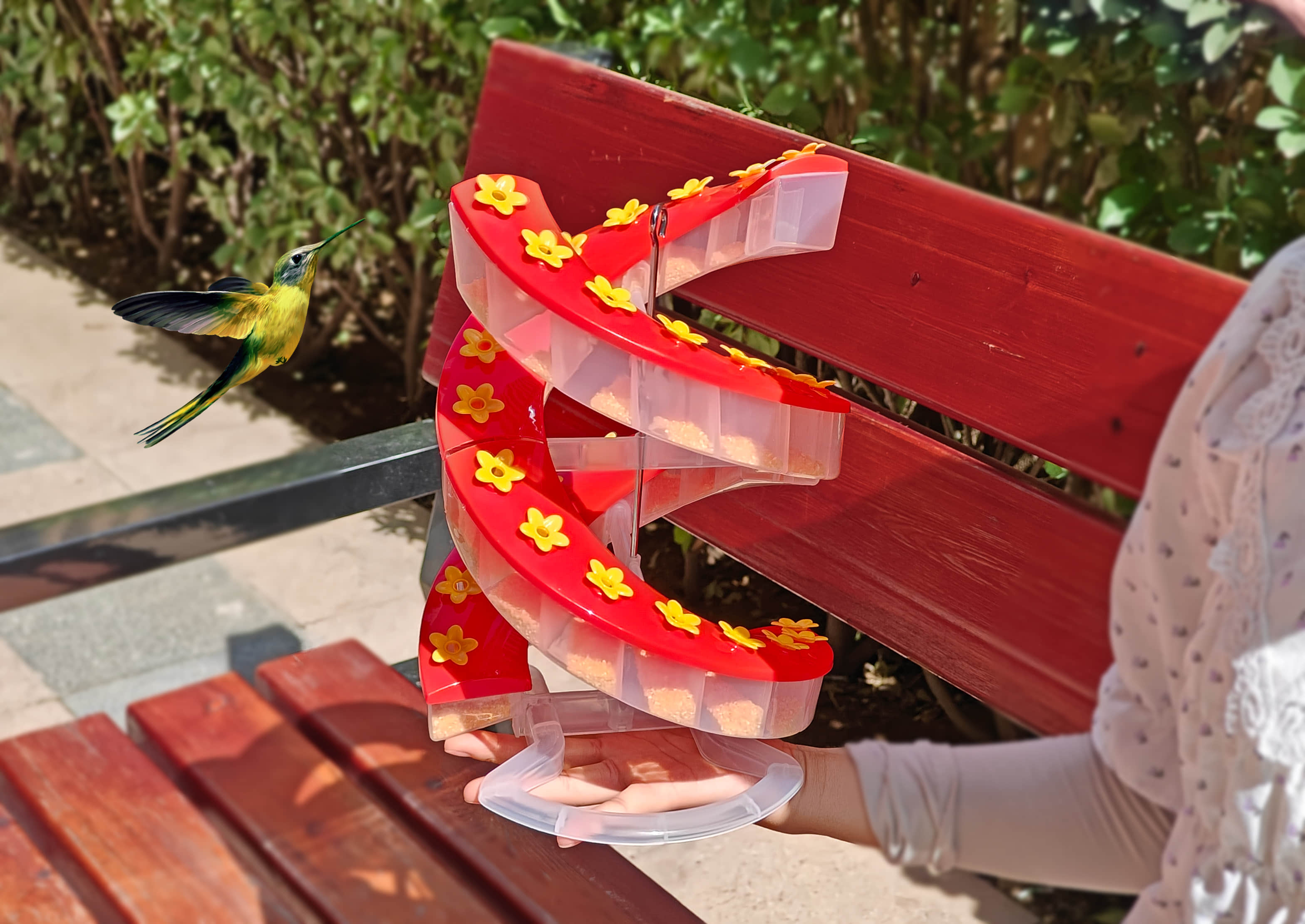 Sherem DNA Helix Hummingbird Feeder in use in a garden